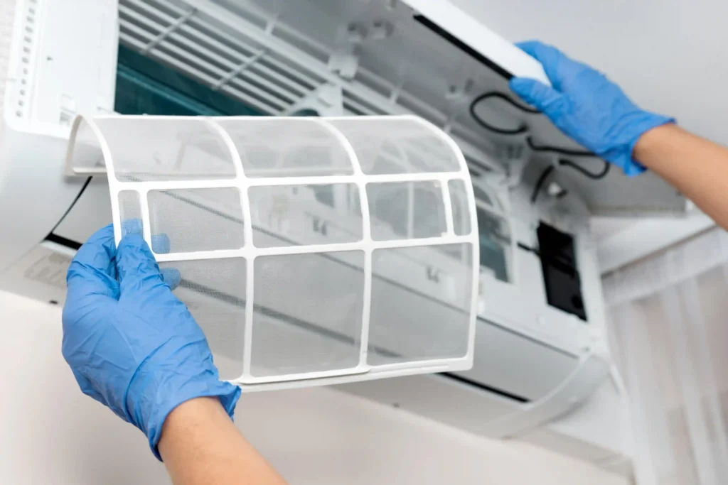 Technician performing deep ac cleaning service